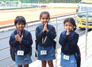 Happy Kids greeting with namaste in School in varthur